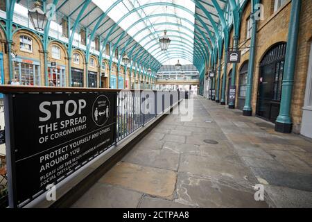 London, UK. - 21 Sept 2020: A safety message at a deserted Covent Garden retail area. The shot was taken at 11.30am on a weekday, when the area would normally be full of tourists and other visitors. Stock Photo