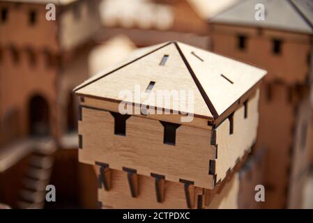 House constructor made of thin wooden parts, educational toys for children. Stock Photo