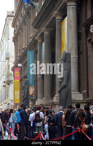 Turin, Piedmont/Italy -04/20/2019- Turin visitors queuing at the entrance to the historic Egyptian museum. Stock Photo