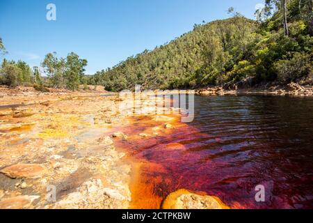 Panorama of part of the Rio Tinto red stream in Huelva, Spain Stock Photo