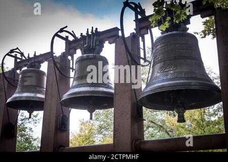 The bells associated with the Chapelle Notre Dame du Haut in Ronchamp by Le Corbusier. Stock Photo