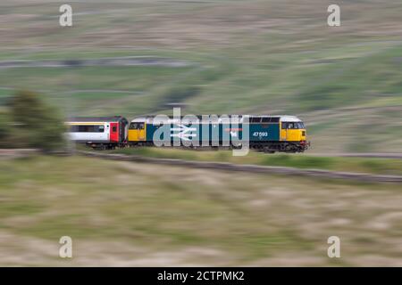 Large Logo livery class 47 47593 on the rear of the The 'Staycation Express' train on the Settle to Carlisle railway line Stock Photo