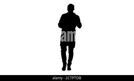 Silhouette Concentrated medical doctor reading documentation while