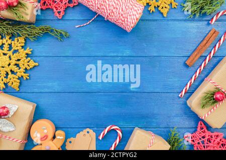 Christmas decoration full borders on blue wooden table with copy space. Christmas background Stock Photo