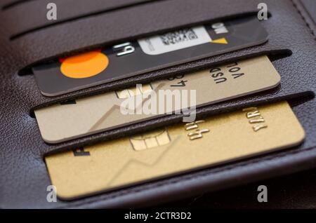 Black leather wallet with credit and discount cards Stock Photo