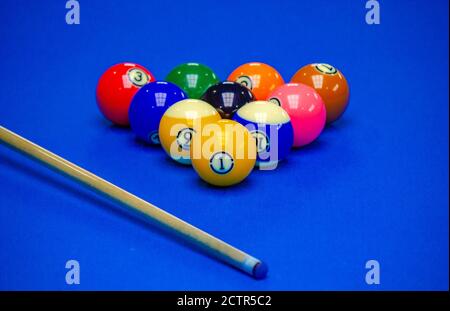 Background image of Billiard balls in a blue pool table, billiards game Stock Photo