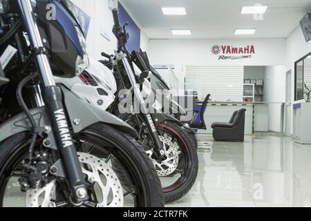 Lima, Peru - September 22, 2020: Motorcycles in the showroom Yamaha shop. New motorbikes and accessories in motorcycle store. Stock Photo