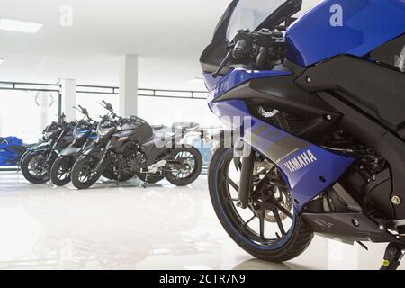 Lima, Peru - September 22, 2020: Motorcycles in the showroom Yamaha shop. New motorbikes and accessories in motorcycle store. Stock Photo