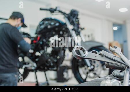 Motorcycle mechanics workshop, professional tools, selective focus. Stock Photo