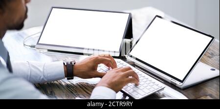 African American Working Working On Laptop Computer Screen Stock Photo