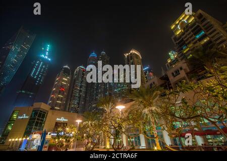 Hotel and apartment buildings towering over the marina shopping district in Dubai, United Arab Emirates Stock Photo