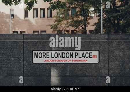 London, UK - August 25, 2020: Street name sign on More London Place, a part of London Bridge City area that includes the City Hall, The Scoop amphithe Stock Photo
