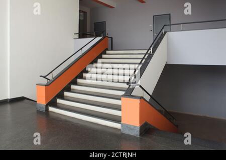 Staircase of the north wing of the Bauhaus Building designed by German modernist architect Walter Gropius (1925-1926) in Dessau in Saxony-Anhalt, Germany. Stock Photo