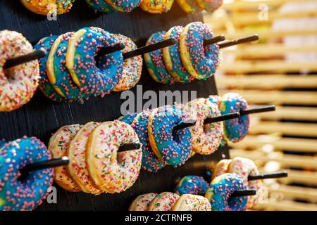 Assorted donuts on a wand. Dessert colorful snack Stock Photo