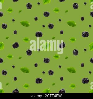 Falling Bramble Seamless pattern. Fresh Falling blackberry seamless pattern. Pattern with fresh wild berries isolated on green background. Stock Photo