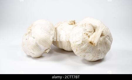 Group of garlic bulbs on white background Stock Photo