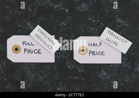 original product vs dupe imitation conceptual still-life, shopping bags  with labels side by side with similar paper color symbol of cheap product  alte Stock Photo - Alamy