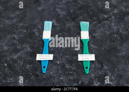original product vs dupe imitation conceptual still-life, shopping bags  with labels side by side with similar paper color symbol of cheap product  alte Stock Photo - Alamy