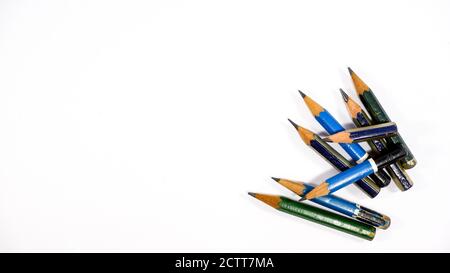 Group of tiny used architect pencils on white background Stock Photo