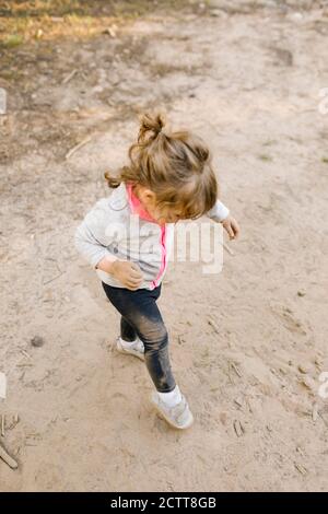 Girl (2-3) playing in sand, Wasatch Cache National Forest Stock Photo