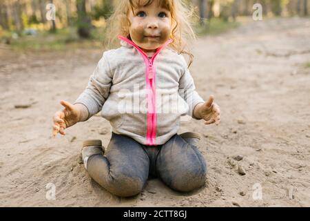 Girl (2-3) playing in sand, Wasatch Cache National Forest Stock Photo