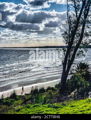 View of the coast of Atlantida in Canelones Uruguay with a cloudy sky Stock Photo