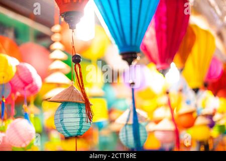 Decorated colorful lanterns hanging on a stand in the streets of Cholon in Ho Chi Minh City, Vietnam during Mid Autumn Festival. Chinese language in p