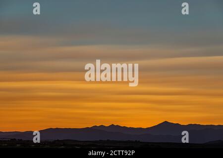USA, Idaho, Sun Valley, Dramatic sky over mountains at sunrise Stock Photo