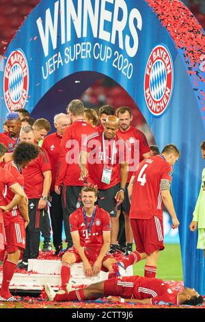 Budapest, Hungary, 24th September 2020.   Celebration with trophy     Thomas MUELLER, MÜLLER, FCB 25 Sven ULREICH, FCB 26 goalkeeper,   Serge GNABRY, FCB 7     in the Final UEFA Supercup match FC BAYERN MUENCHEN - FC SEVILLA  2-1 in Season 2019/2020, FCB, Munich, © Peter Schatz / Alamy Live News    - UEFA REGULATIONS PROHIBIT ANY USE OF PHOTOGRAPHS as IMAGE SEQUENCES and/or QUASI-VIDEO -  National and international News-Agencies OUT Editorial Use ONLY Stock Photo