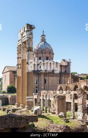 ROME, ITALY - 2014 AUGUST 18. Roman ruins with cityscape of Rome. Stock Photo