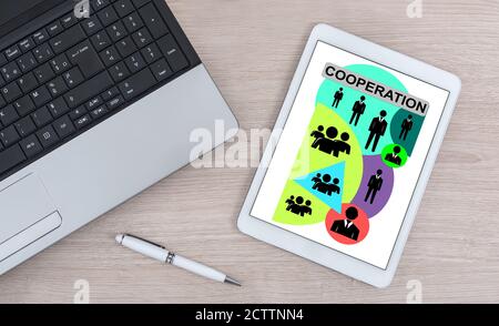 Cooperation concept shown on a digital tablet Stock Photo