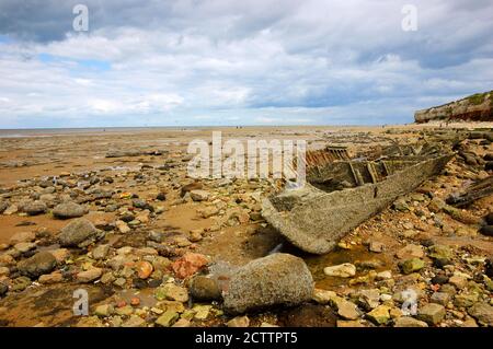 Remains of ship (after shipwreck) at Hunstanton beach, Norfolk, UK. Stock Photo