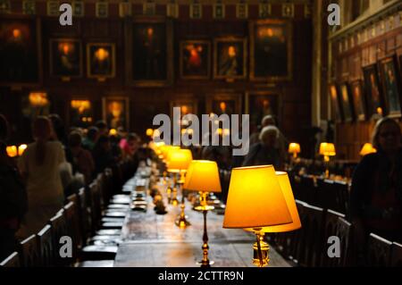 OXFORD, UK - AUGUST 23, 2017: Visitors in Great Dining Hall in Christ Church college of the University of Oxford in England. Stock Photo