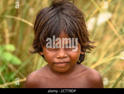 Durgapur/ India-September 24, 2020. Portrait of a innocent Rural kid. Selective focus is used. Stock Photo