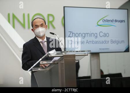 (200925) -- OSTEND, Sept. 25, 2020 (Xinhua) -- Cao Zhongming, Chinese ambassador to Belgium, speaks at a ceremony marking the opening of new 'Air Silk Road' cargo routes between China and Belgium, in Ostend-Bruges International Airport, Ostend, Belgium, Sept. 24, 2020. Ostend-Bruges International Airport in Belgium held a ceremony on Thursday to officially mark the opening of new 'Air Silk Road' cargo routes between China and Belgium. The airport has worked closely with the Beijing Hongyuan Group to open direct cargo flights to major Chinese cities such as Shanghai in East China, Shijiazhua Stock Photo