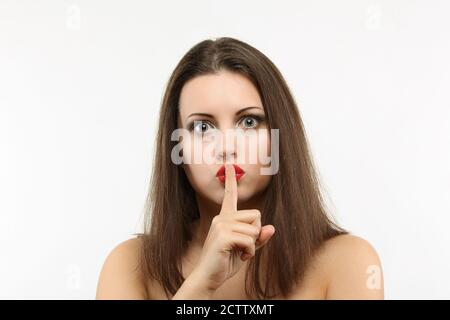 Beautiful woman with funny and shocked expression Stock Photo