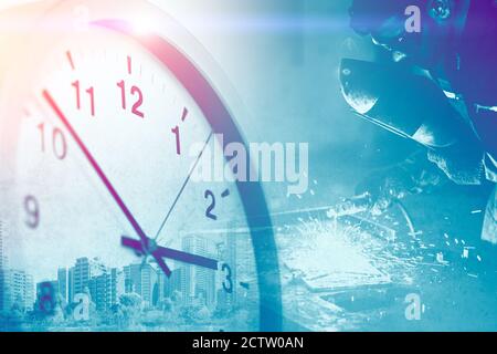 Industry worker overlay with Times clock for business working hours in factory image concept. Stock Photo