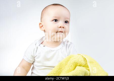 Photo of looking left side eleven-month-old baby Stock Photo