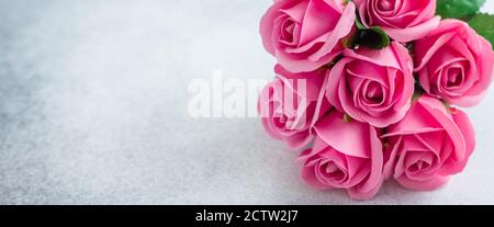 Pink rose flowers bouquet on stone background Beautiful flowers Copy space Stock Photo