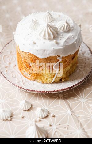 Easter composition. Easter cake decorated with meringue peaks Stock Photo