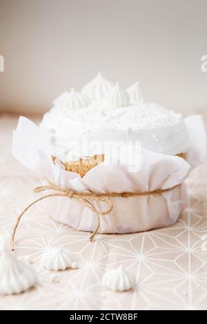 Easter composition. Easter cake decorated with meringue peaks Stock Photo