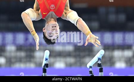 Zhaoqing, China's Guangdong Province. 25th Sep, 2020. Sun Wei of Jiangsu competes during the parallel bars match of men's individual all-round final at the 2020 Chinese National Artistic Gymnastics Championships in Zhaoqing, south China's Guangdong Province, Sept. 25, 2020. Credit: Cheng Min/Xinhua/Alamy Live News Stock Photo