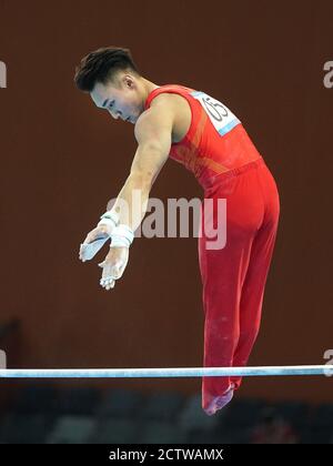 Zhaoqing, China's Guangdong Province. 25th Sep, 2020. Sun Wei of Jiangsu competes during the horizontal bar match of men's individual all-round final at the 2020 Chinese National Artistic Gymnastics Championships in Zhaoqing, south China's Guangdong Province, Sept. 25, 2020. Credit: Cheng Min/Xinhua/Alamy Live News Stock Photo