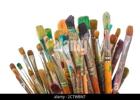 Colorful  Paintbrushes Dropped in Vase on White Background Stock Photo