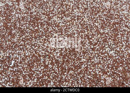 Texture of small brown and white stones, background. Stock Photo