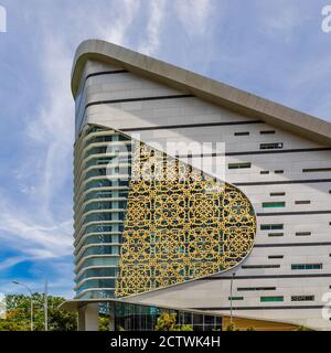 Exterior of Sabah Regional Library at Tanjung Aru Plaza, Kota Kinabalu, Malaysia, incorporating motifs of Sabah's ethnic communities into its design. Stock Photo