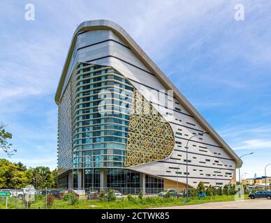 Exterior of Sabah Regional Library at Tanjung Aru Plaza, Kota Kinabalu, Malaysia, incorporating motifs of Sabah's ethnic communities into its design. Stock Photo