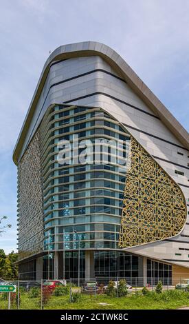 Exterior of Sabah Regional Library at Tanjung Aru Plaza, Kota Kinabalu, Malaysia, incorporating motifs of Sabah's ethnic communities into its design. Stock Photo