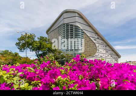 Exterior of Sabah Regional Library at Tanjung Aru Plaza, Kota Kinabalu, Malaysia, incorporating motifs of Sabah's ethnic communities into its design. Stock Photo