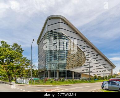 Exterior of Sabah Regional Library at Tanjung Aru Plaza, Kota Kinabalu, Malaysia, incorporating motifs of Sabah's ethnic communities into its design. Stock Photo